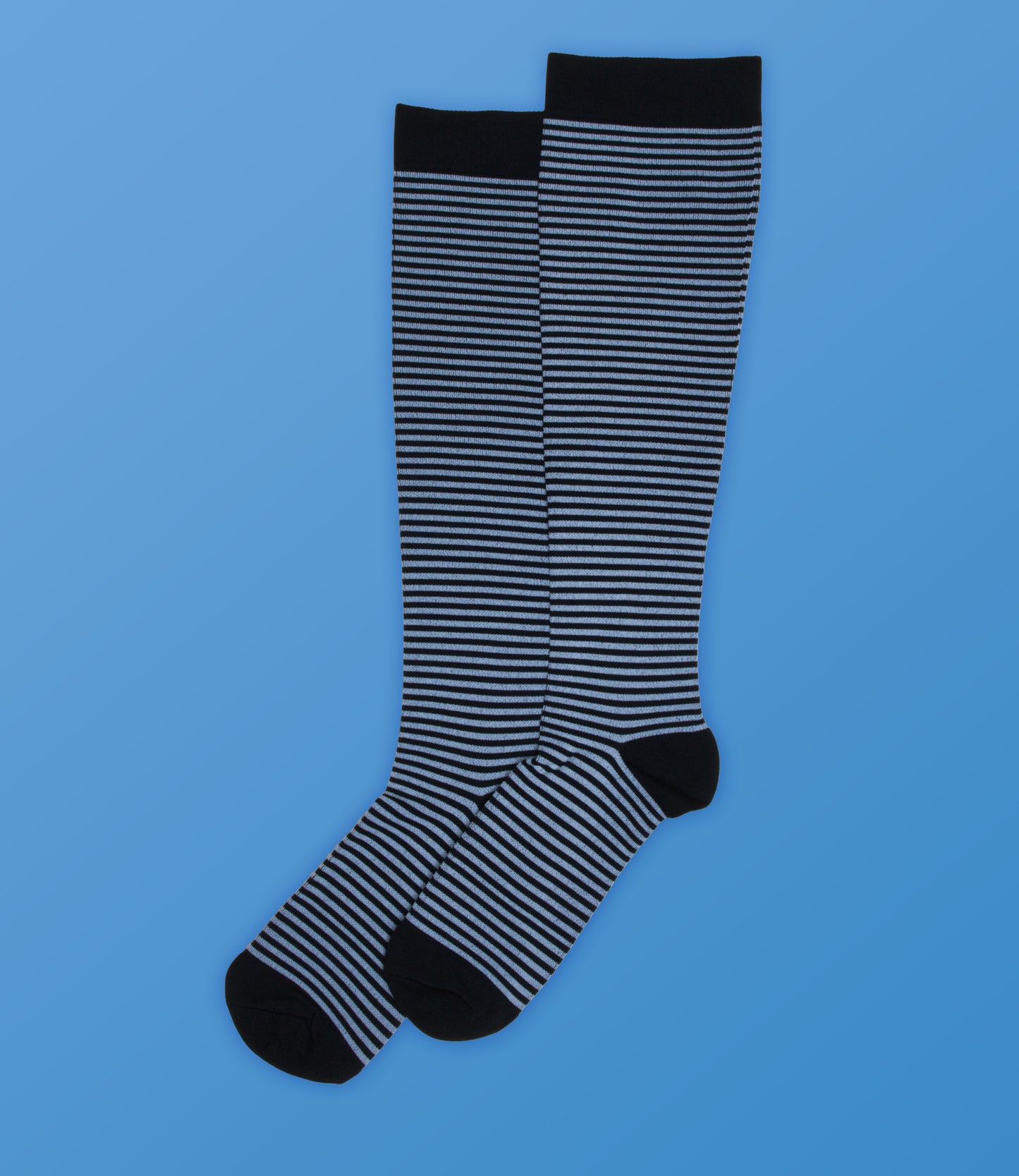 Chaussettes de compression à fines rayures noires et blanches